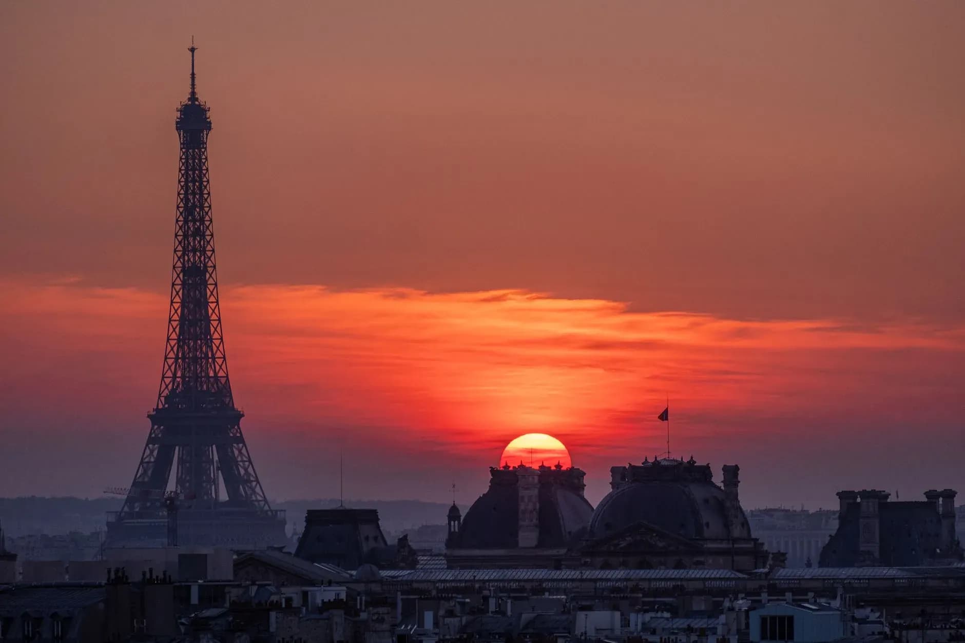 Eiffel Tower at sunset from a rooftop on a luxury private Paris tour