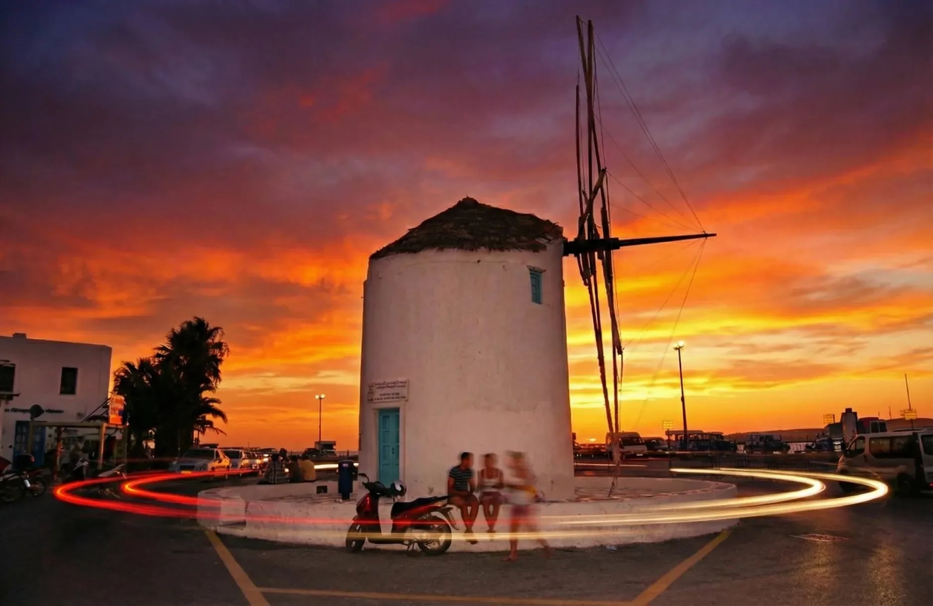The windmills of Mykonos above the whitewashed town and the Aegean sea