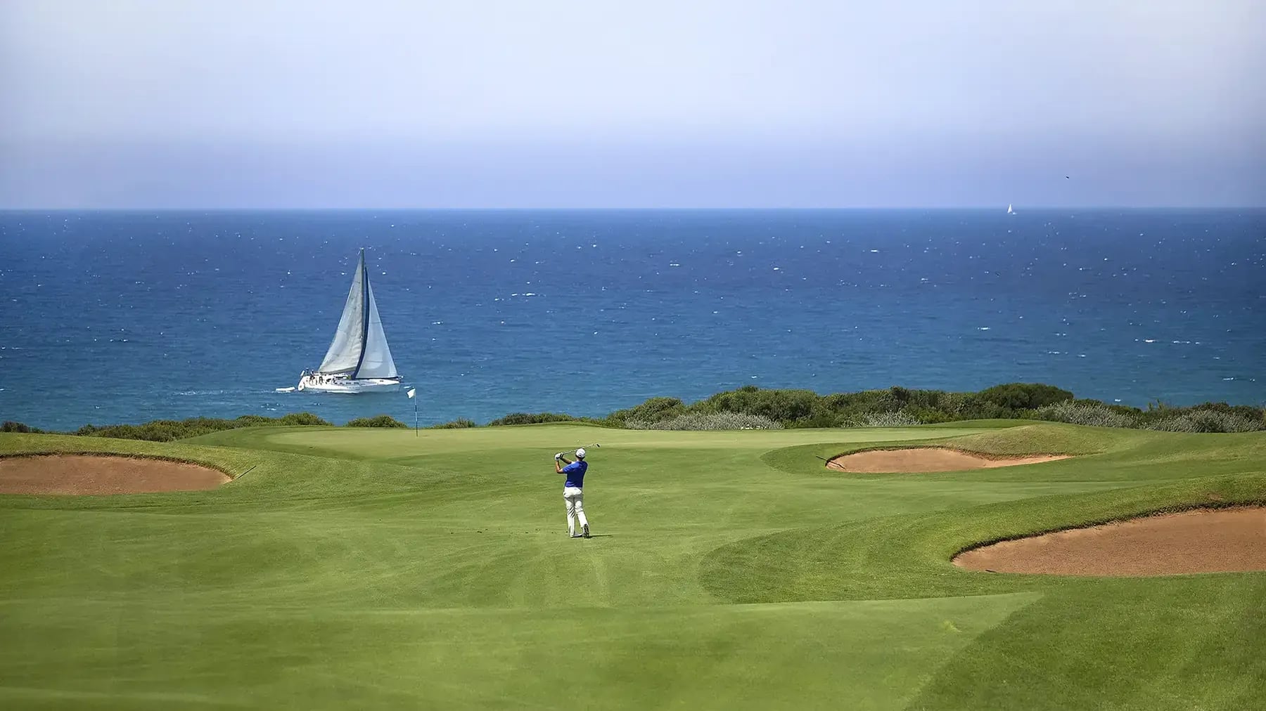 Championship golf course fairway beside the coast on a luxury golf vacation