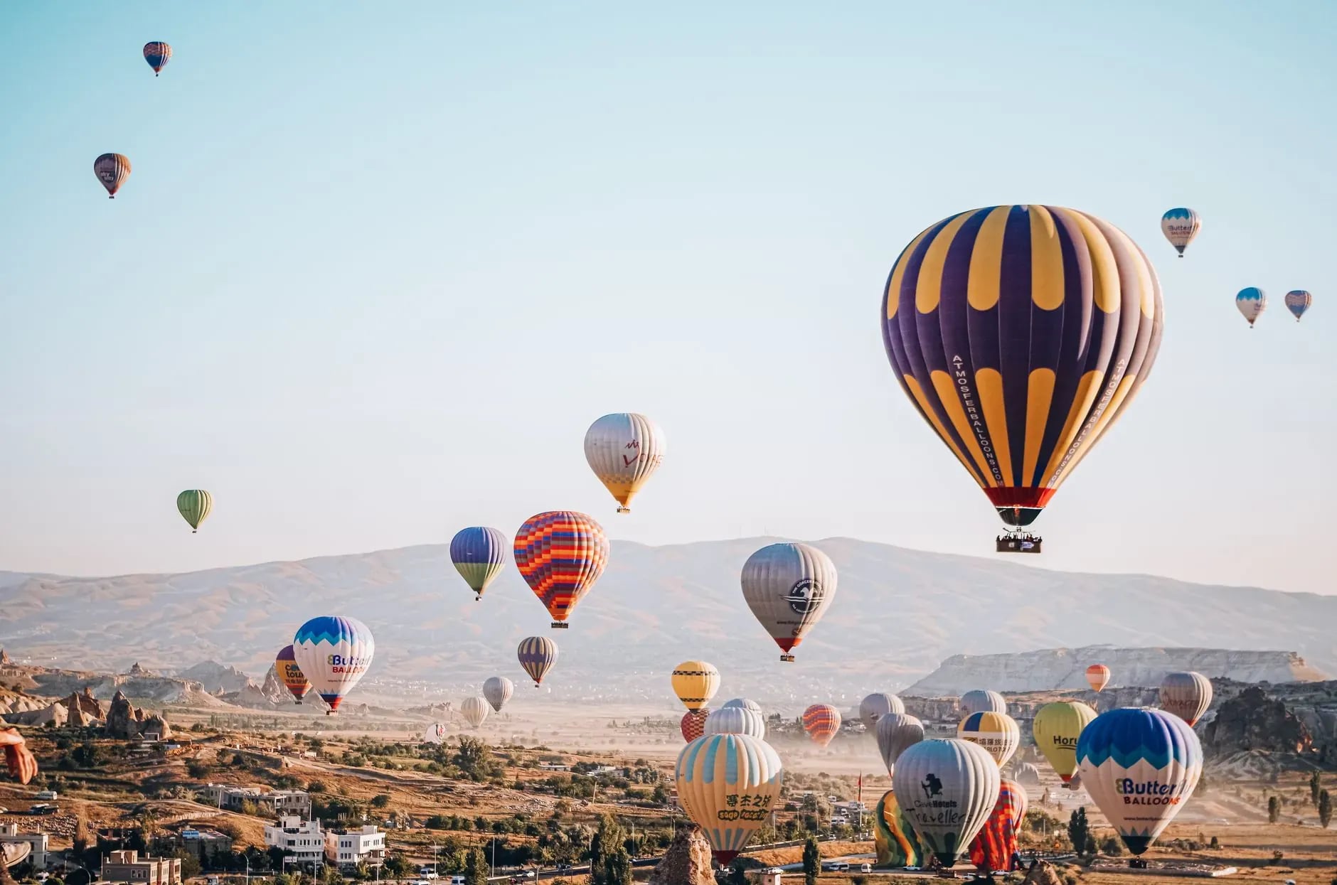 Hot air balloons over Cappadocia in perfect morning weather