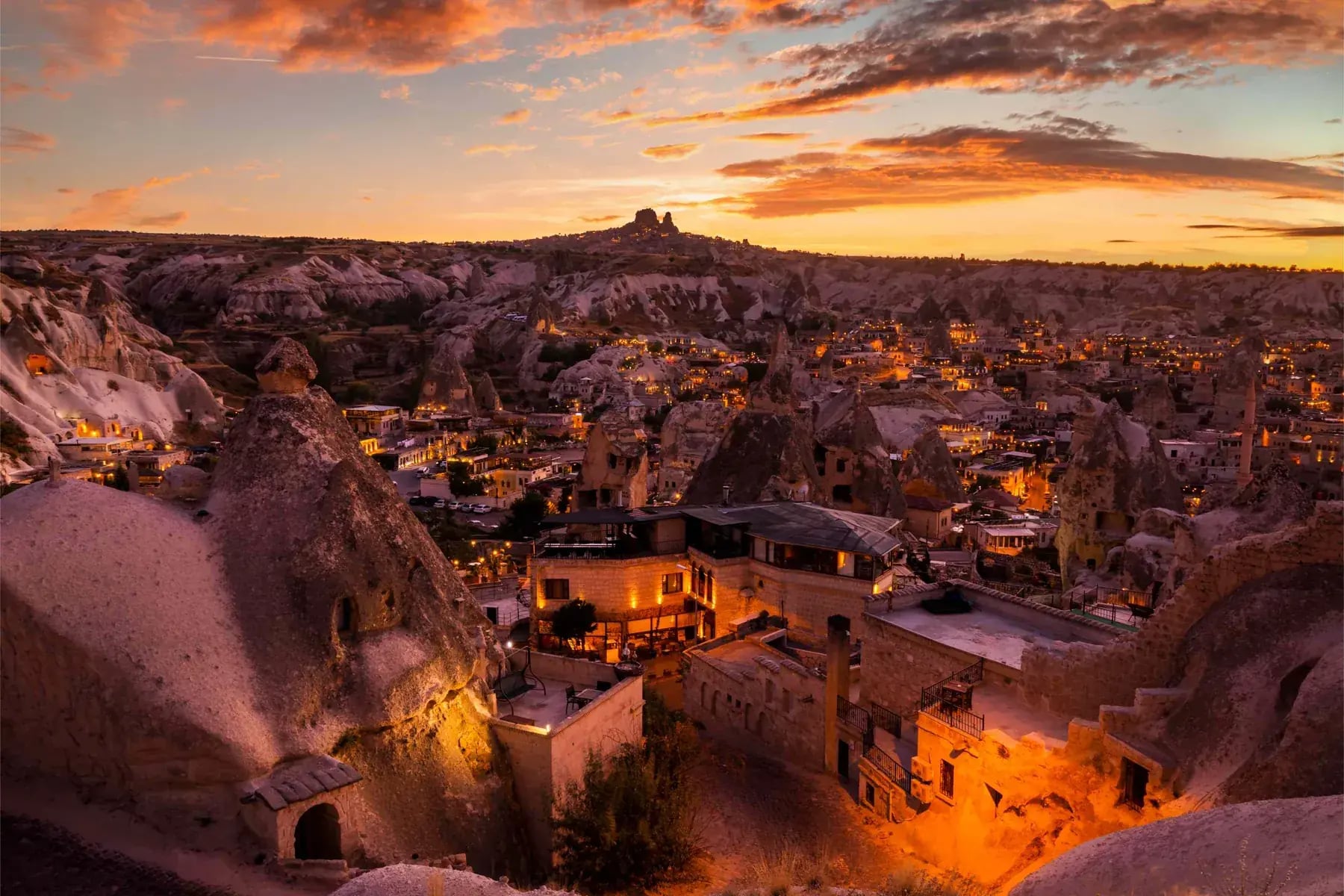 Golden evening light across the fairy chimneys and valleys of Cappadocia