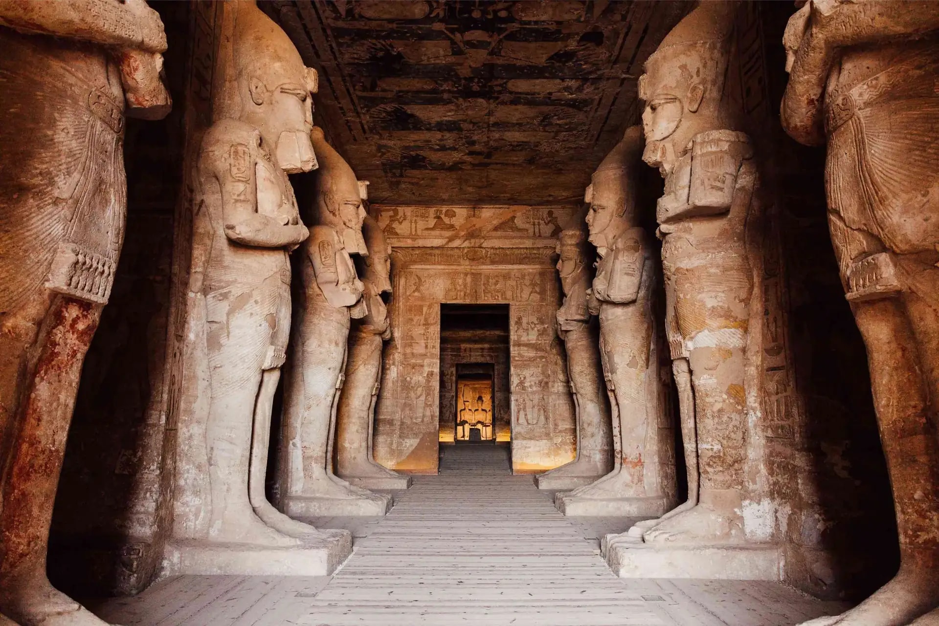 Colossal statues inside the rock-cut temple of Abu Simbel, Egypt