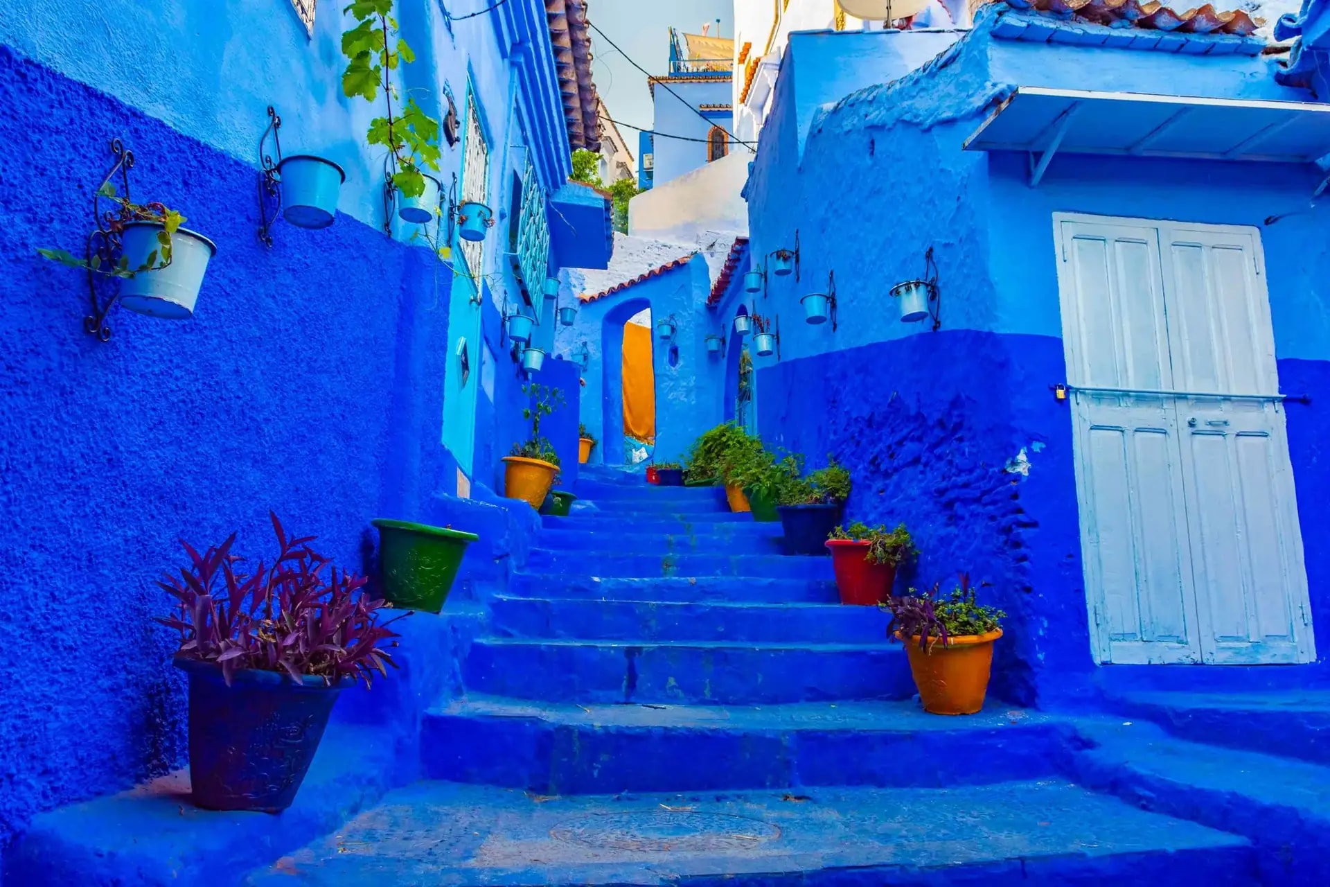 Blue-washed steps and doorways in the mountain town of Chefchaouen, Morocco