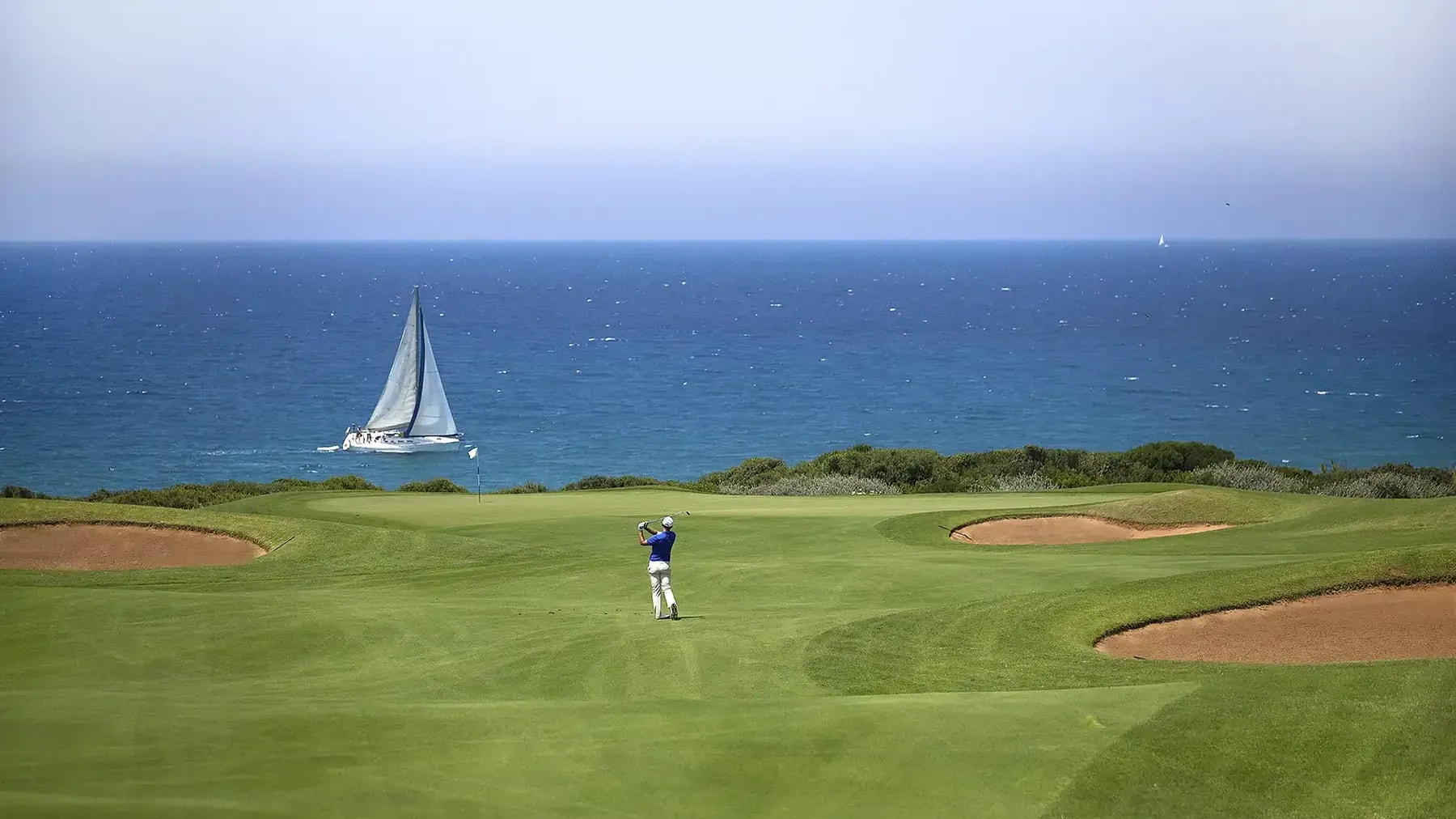 Championship golf course fairway beside the coast on a luxury golf vacation